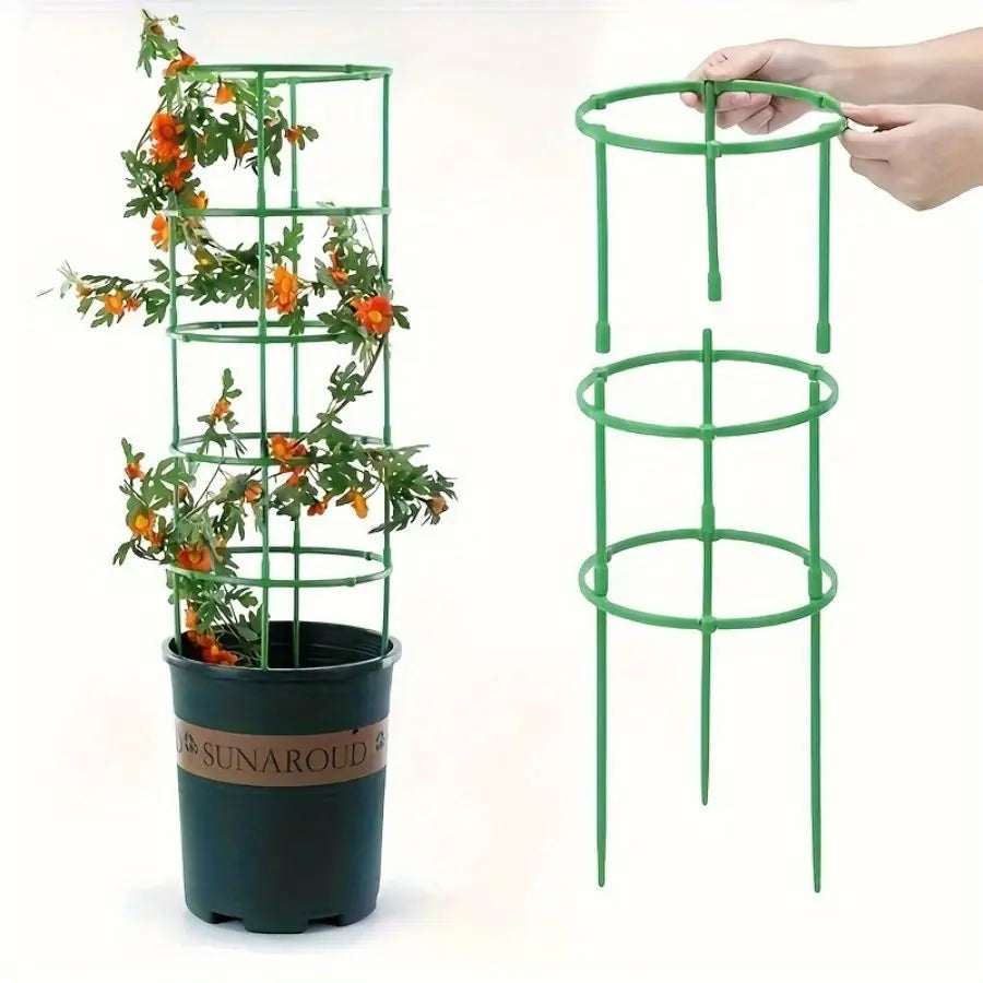 Green metal plant trellis with a potted plant and another trellis.